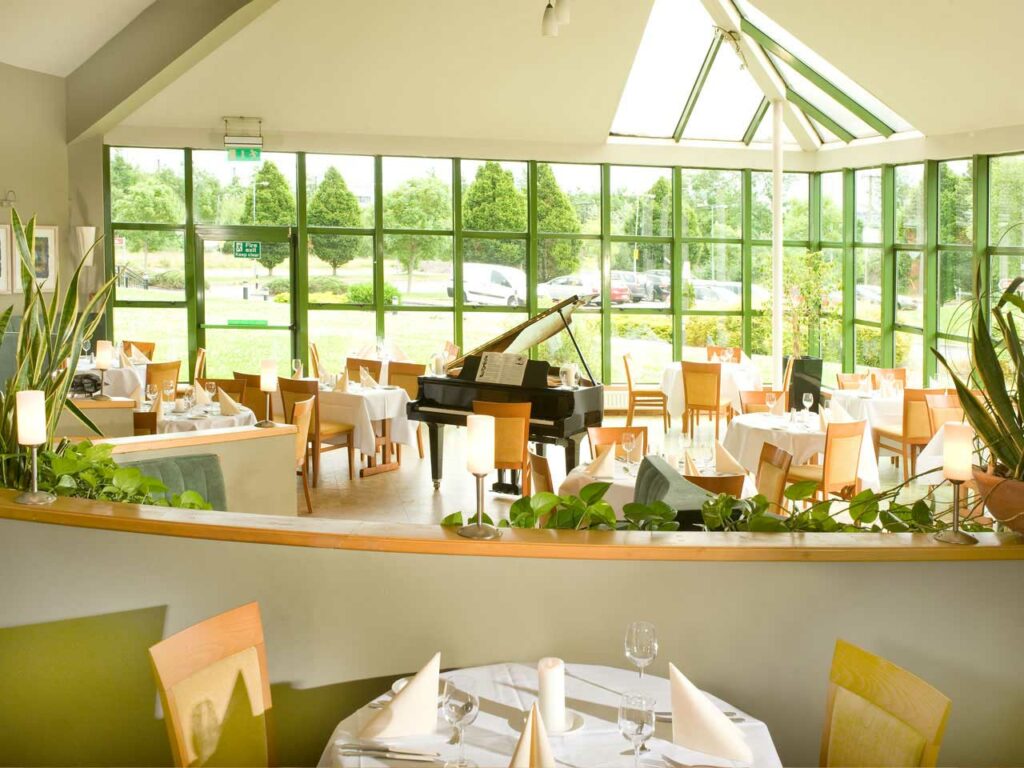 lounge and dining area at Great National Commons Inn Hotel