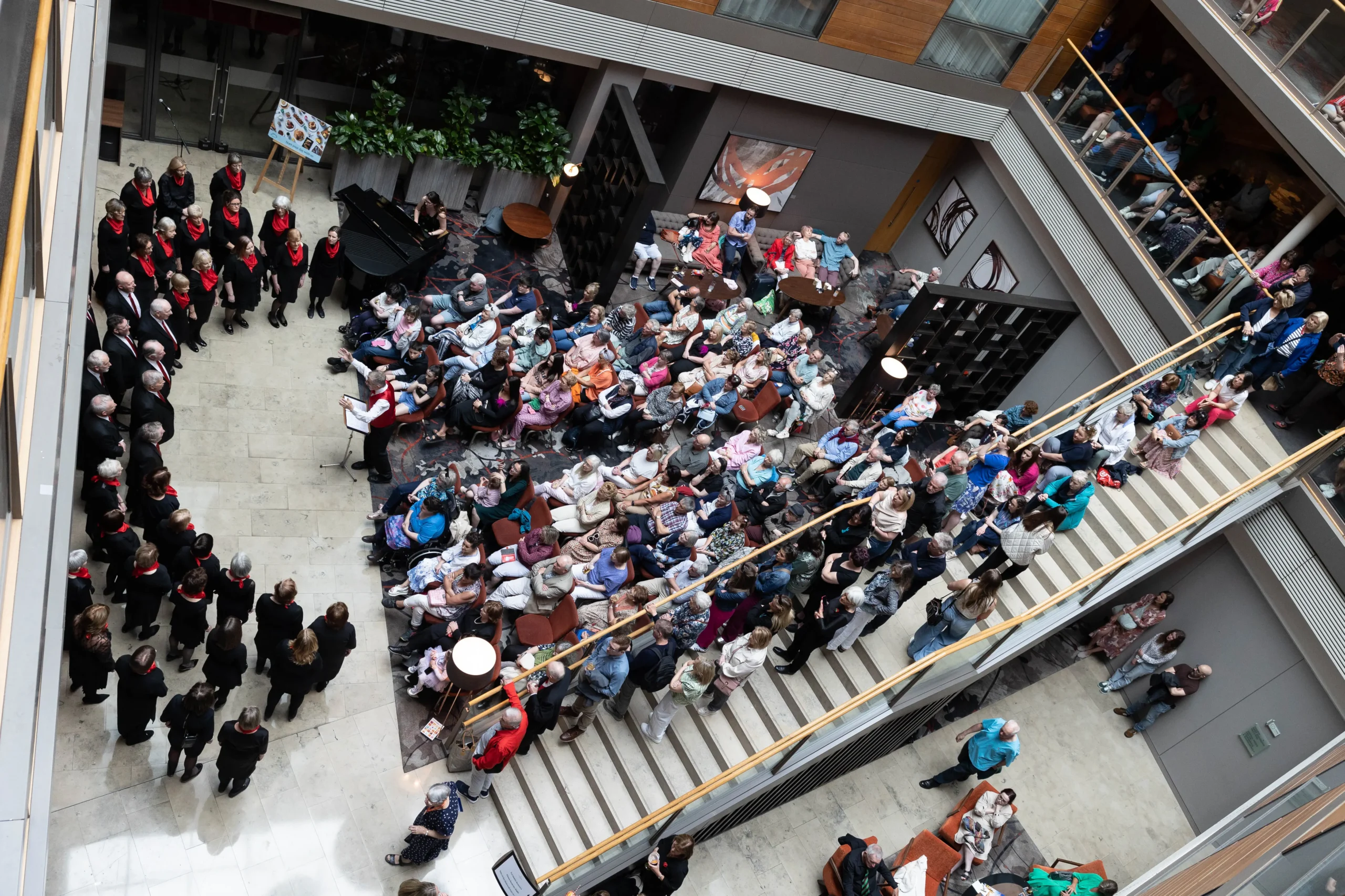 Choirs performing in the lobby of the Clayton Hotel Cork City